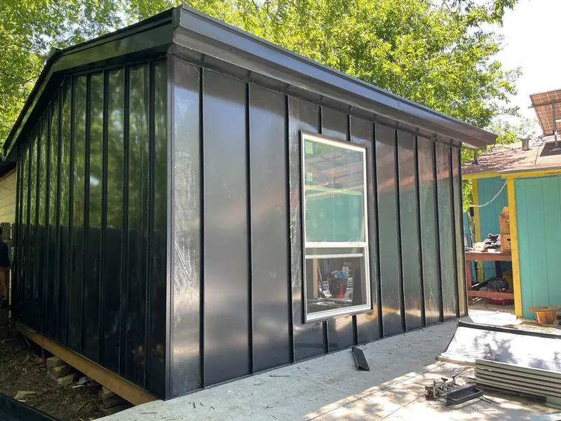 Black standing seam metal wall panels for Roof Inspection in Tuscaloosa