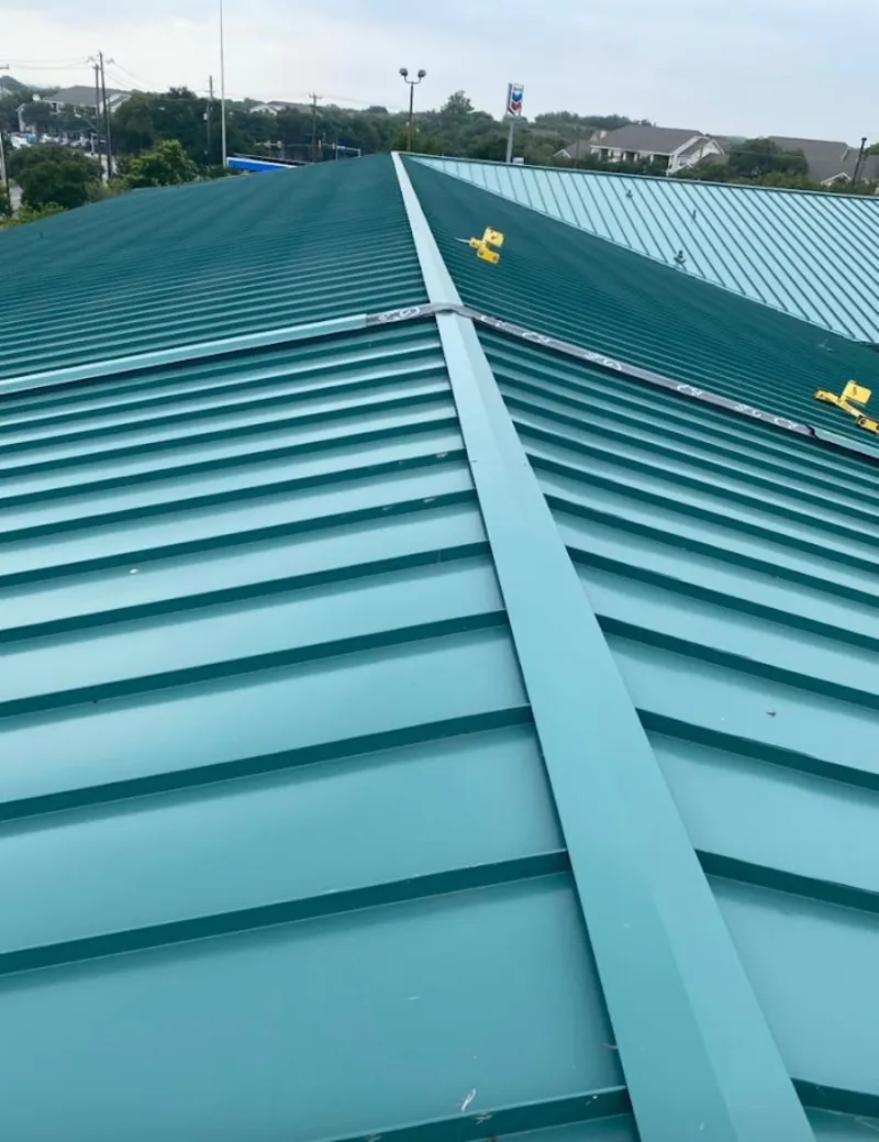 Green commercial metal roof ridge and valley for Metal Roof Repair in Tuscaloosa